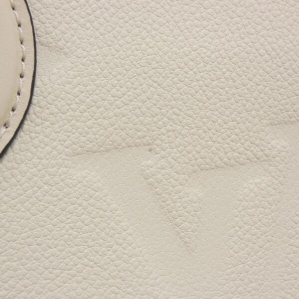 Louis_Vuitton_Monogram_Empreinte_Onthego_PM_Bag_M46569_3