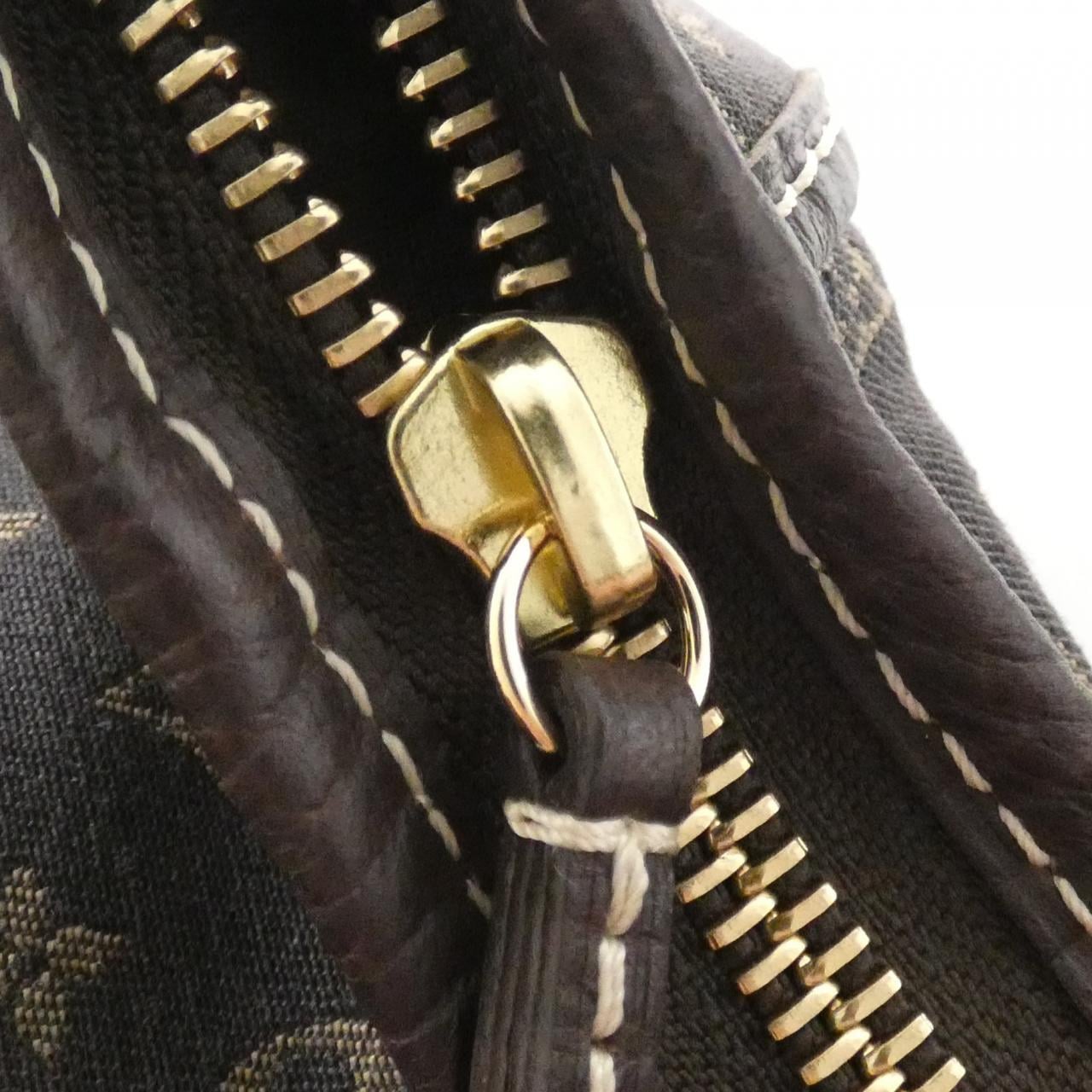 Louis_Vuitton_Monogram_Mini_Lin_Manon_PM_M95621_Shoulder_Bag_4